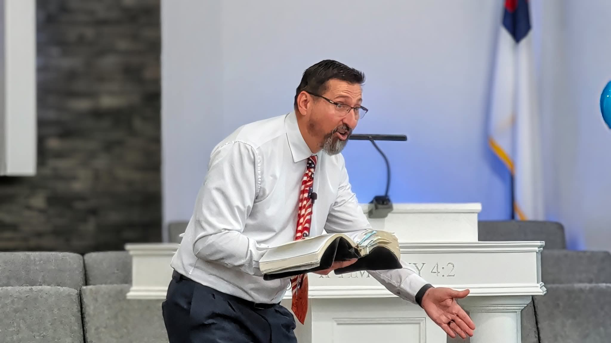 Pastor Nathan Noyes preaching at Gethsemane Church
